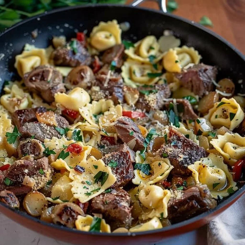 Delicious Garlic Parmesan Steak Tortellini cooked in a one-pot skillet.